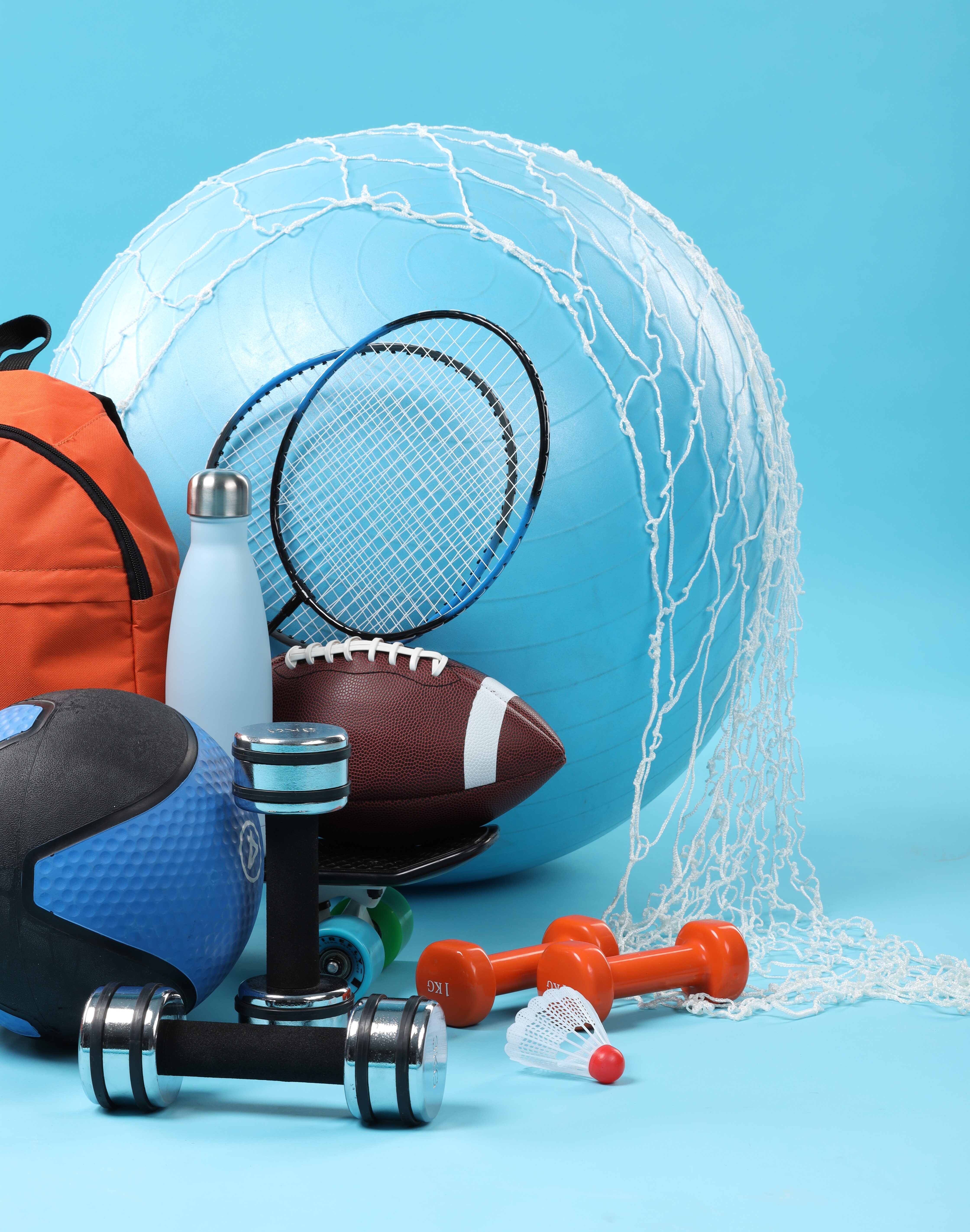 many-different-sports-equipment-light-blue-background