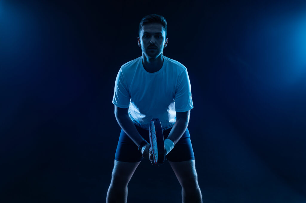 padel-tennis-player-padel-open-tour-man-athlete-with-paddle-tenis-racket-ball-blue-background-sport-concept-download-high-quality-photo-sports-ads-social-media-stories-shorts